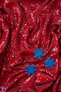 红色的节日背景闪闪发光的蓝色的装饰圣诞节树刻字问候卡