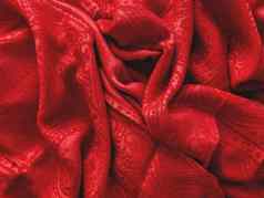 明亮的红色的围巾折叠温暖的附件皱巴巴的纺织背景点缀前视图织物背景