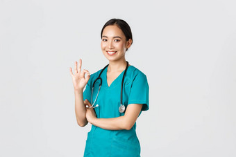 科维德医疗保健工人流感大流行概念自信专业亚洲医生女医生实习医生风云显示手势保证质量服务医院批准同意