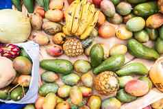 前视图热带水果织物背景芒果鳄梨菠萝香蕉热带水果概念食物生产尼加拉瓜拉丁美国