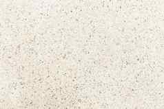 米色垃圾背景自然水泥石头纹理复古的模式墙