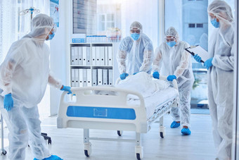 医疗科学团队移动医院床上生物危害团队有害物质西装保护流感大流行生物学家团队收集死身体医院csi团队移动医院床上死身体