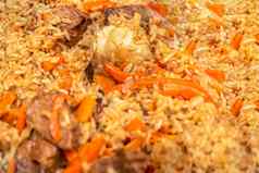 皮拉夫特写镜头东方厨房概念国家乌兹别克皮拉夫肉铸铁锅前视图羊肉devzira大米