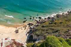 岩石桑迪海滩悬崖旅游度假胜地挤大西洋海岸葡萄牙