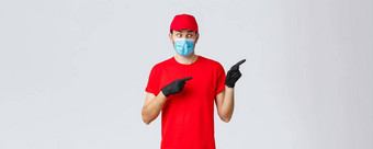 科维德self-quarantine在线购物航运概念震惊了深刻的印象交付的家伙医疗面具手套指出盯着促销说不出话来穿统一的