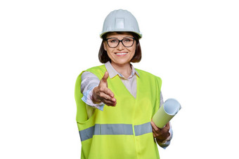 女工业工人需要戴安全帽的背心扩展<strong>手握手</strong>