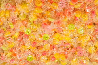 彩色的<strong>咀嚼片</strong>甜蜜的糖糖果有害的婴儿食物背景