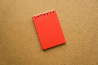 红色的记事本笔记红色的表空白空间笔记灭克磷灰色的温暖的赭色卡夫背景假期日历笔记记事本背景碑文小记事本春天
