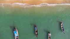 钓鱼船海滨热带岛屿码头村民们南部岛泰国前视图drones