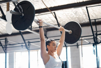 女人运动员健身锻炼健身房提升重重量有氧运动锻炼健康健康动机培训强大的健康的强大的女人举重