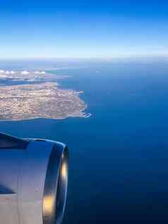 视图飞机窗口天空海洋蓝色的
