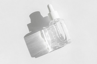 透明的液体产品包装玻璃瓶反老化血清胶原蛋白肽白色阳光影子透明质酸聚麸胺酸石油化妆品模型