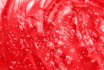 红色的保湿霜涂片血清液体化妆品果冻化妆品产品透明质酸酸碳粉斯沃琪透明的奶油样本涂抹胶原蛋白维生素过来这里纹理泡沫特写镜头