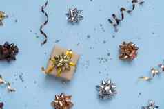 礼物盒子明亮的节日背景弓珠子前视图圣诞节礼物平躺