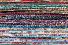 多彩色的地毯地毯堆栈色彩斑斓的纹理背景