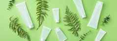 护肤品有机美产品瓶植物叶子绿色背景