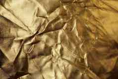 金箔纹理闪亮的折叠摘要黄金背景
