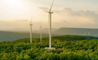 风<strong>能源</strong>风权力可持续发展的可再生<strong>能源</strong>风涡轮机生成电风车农场山日落天空<strong>绿色</strong>技术可再生资源可持续发展的发展