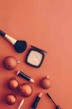 化妆化妆品产品集美品牌圣诞节出售促销活动古董橙色平铺背景假期设计