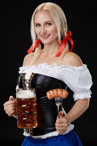 女服务员传统的<strong>德国</strong>服装持有<strong>啤酒</strong>玻璃<strong>啤酒</strong>节