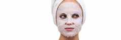 特写镜头肖像女人淋浴白色化妆品面具脸使无纺布织物