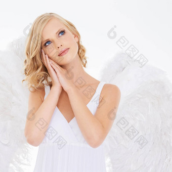 <strong>纯纯</strong>洁的工作室拍摄年轻的女人天使翅膀孤立的白色