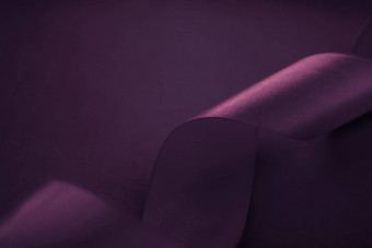 摘要<strong>卷</strong>曲的丝绸丝带紫色的背景独家奢侈品品牌设计假期出售产品促销<strong>活动</strong>魅力艺术邀请卡背景