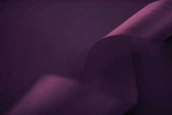 摘要卷曲的丝绸丝带紫色的背景独家奢侈品品牌设计假期出售产品促销活动魅力艺术邀请卡背景