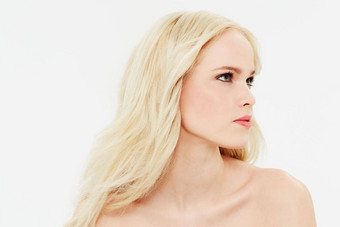 出生模型美丽的金发女郎模型一边白色背景