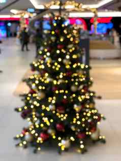 模糊装饰圣诞节树购物购物中心背景
