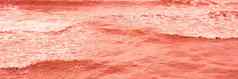 真正的照片海水波摘要背景自然权力明亮的橙色红色的语气股票