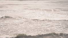 真正的照片海水波摘要背景自然权力苍白的光灰色棕色（的）不光滑的语气股票