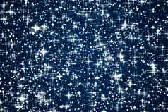 魔法奢侈品快乐假期背景银闪闪发光的闪闪发光的星星神奇的发光黑暗蓝色的摘要纹理明星灰尘粒子布满星星的晚上空间天空魅力假期