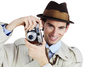 拍摄侦探采取照片复古的相机白色背景微笑
