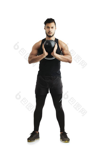 时间史诗<strong>水壶</strong>贝尔锻炼工作室拍摄适合年轻的男人。工作<strong>水壶</strong>贝尔白色背景