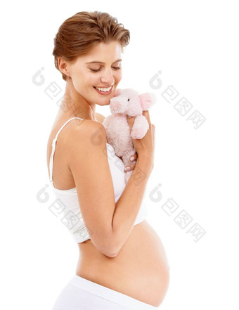 怀孕婴儿泰迪熊快乐女人爱大胃微笑孩子玩具母亲爱猪娃娃怀孕了妈妈幸福兴奋孩子护理母亲家庭