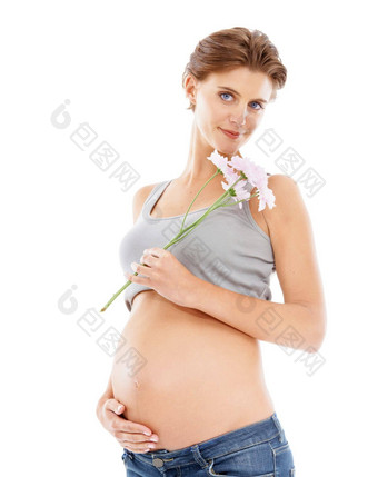 花怀孕了女人工作室肖像怀孕护肤品脂肪团美化妆品医疗保健健康妈妈。手胃花自然产品广告