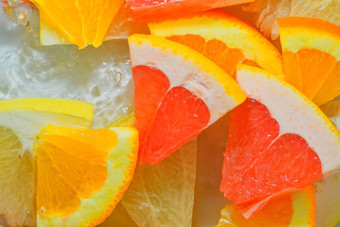 块葡萄柚橙色水果蜂蜜葡萄柚液体泡沫片葡萄柚橙色水果蜂蜜葡萄柚水新鲜的片葡萄柚橙色水果蜂蜜葡萄柚白色背景前视图平设计水平宏图像