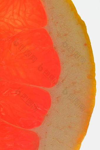 葡萄柚新鲜的有机葡萄柚片白色背景葡萄柚特写镜头片血红色的成熟的葡萄柚纹理红色的多汁的葡萄柚宏细长立式图像