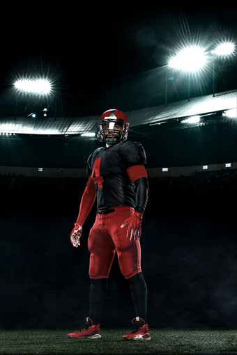 美国足球球员运动员运动员红色的头盔体育场背景体育运动动机壁纸