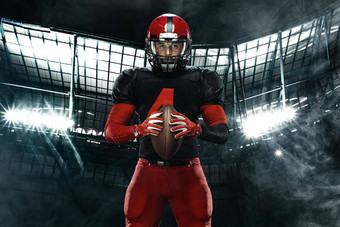 美<strong>国足</strong>球球员运动员运动员<strong>红</strong>色的头盔体育场背景体育运动动机壁纸