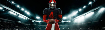 美国足球球员运动员运动员红色的头盔体育场背景体育运动动机壁纸宽照片