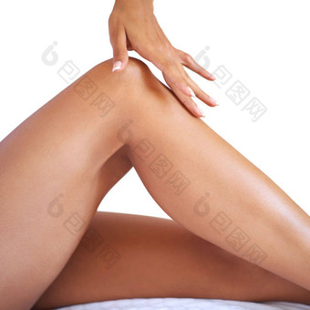 女人触摸腿护肤品美健康激光头发删除女手腿健康的皮肤护理身体化妆品发光拔毛软审美自然发光结果