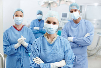 外科医生承诺优秀的护理肖像集团外科医生穿医院实习医生风云脸面具保护手套操作房间