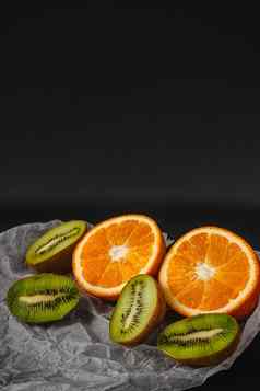 豪华的水果背景橙色猕猴桃减少工作室摄影水果孤立的黑色的背景复制空间高决议产品