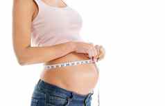 怀孕了女人测量磁带胃白色背景检查增长发展健康腹部健康怀孕护理饮食健康的进步目标模拟