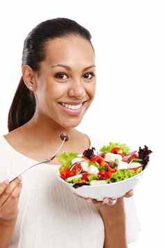 黑色的女人吃蔬菜沙拉快乐饮食营养早餐健康素食主义者孤立的白色背景工作室非洲女孩微笑肖像健康的食物餐生菜午餐