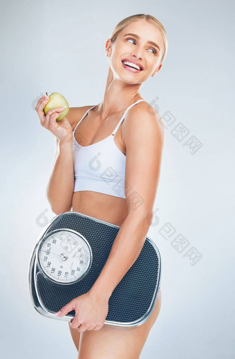苹果饮食女人规模身体健康护理自然重量损失吃健康的食物营养生活方式健康锻炼培训脂肪锻炼灰色的工作室背景