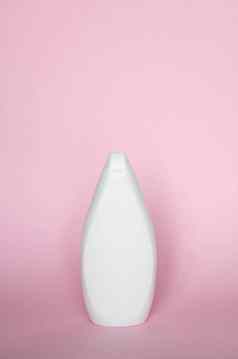 白色瓶液体肥皂洗发水过来这里粉红色的背景
