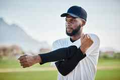 棒球体育场伸展运动黑色的男人。场准备好了思考培训匹配球场夏天锻炼锻炼健身心态体育球员温暖的开始玩垒球